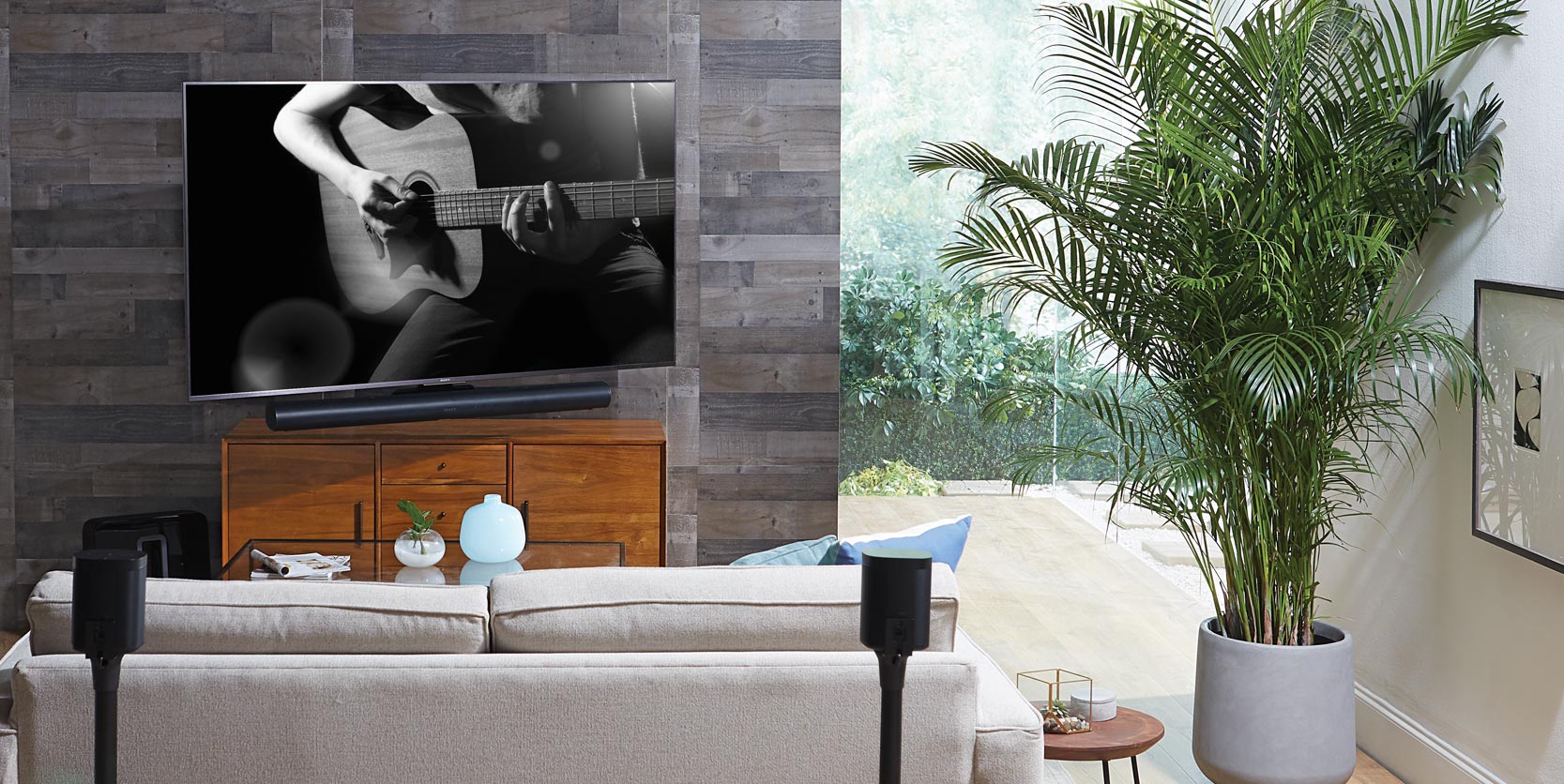 Extendable Soundbar Wall Mount shown used in living room setting.